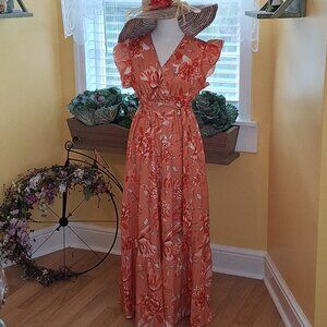 Floral tiered maxi dress in shades of orange.